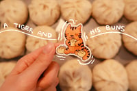 a tiger and his buns