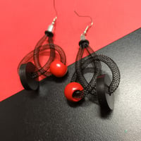 Image 2 of medium size mesh knot earrings black/red
