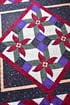 Pinwheel Poinsettia Quilt Image 4