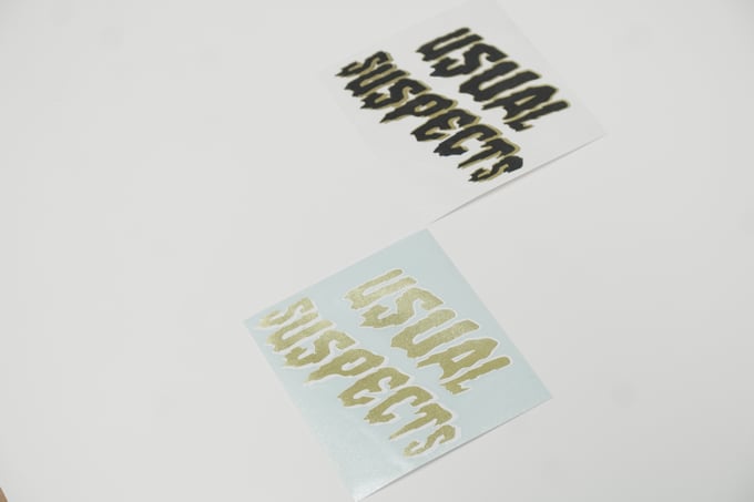 Image of Sparkle Gold Premium Suspects Decal