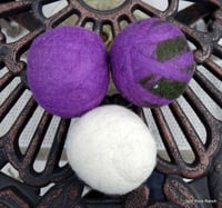 Set of 3 Wool Dryer Balls in Cream, Purple, and Purple/Black ON SALE