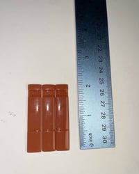 Tan/flesh gunmounts (wide bars) one lb 