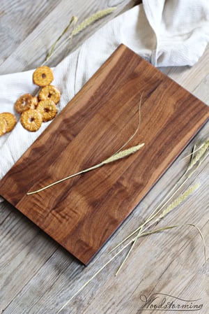 Image of Walnut wood serving board, cheese or charcuterie board