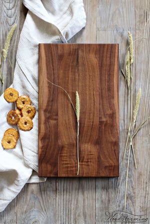 Image of Walnut wood serving board, cheese or charcuterie board