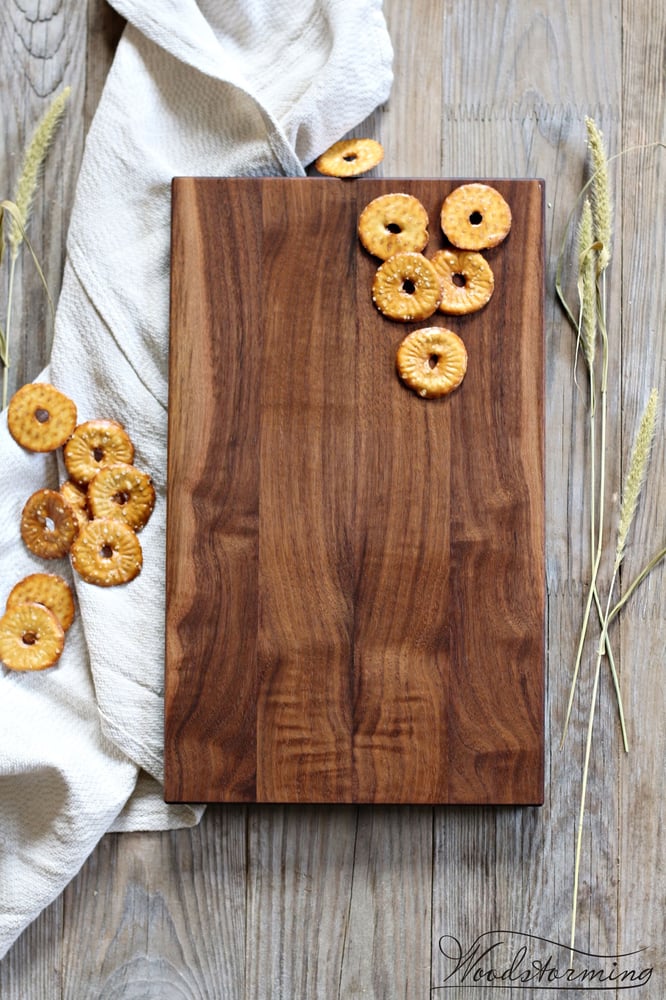 Image of Walnut wood serving board, cheese or charcuterie board