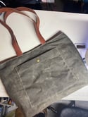 Waxed canvas and leather handles zip tote