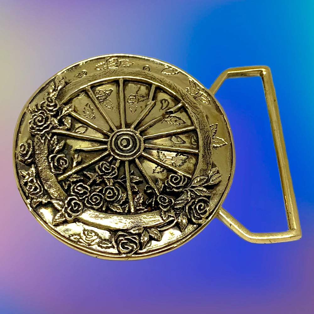 Image of The Wheel Buckle Cast in Yellow Brass