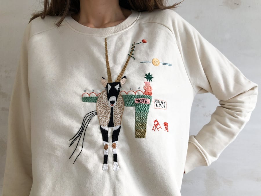 Image of Domestika Original: Oryx near the Rest of Hopes Motel - hand embroidered organic cotton sweatshirt