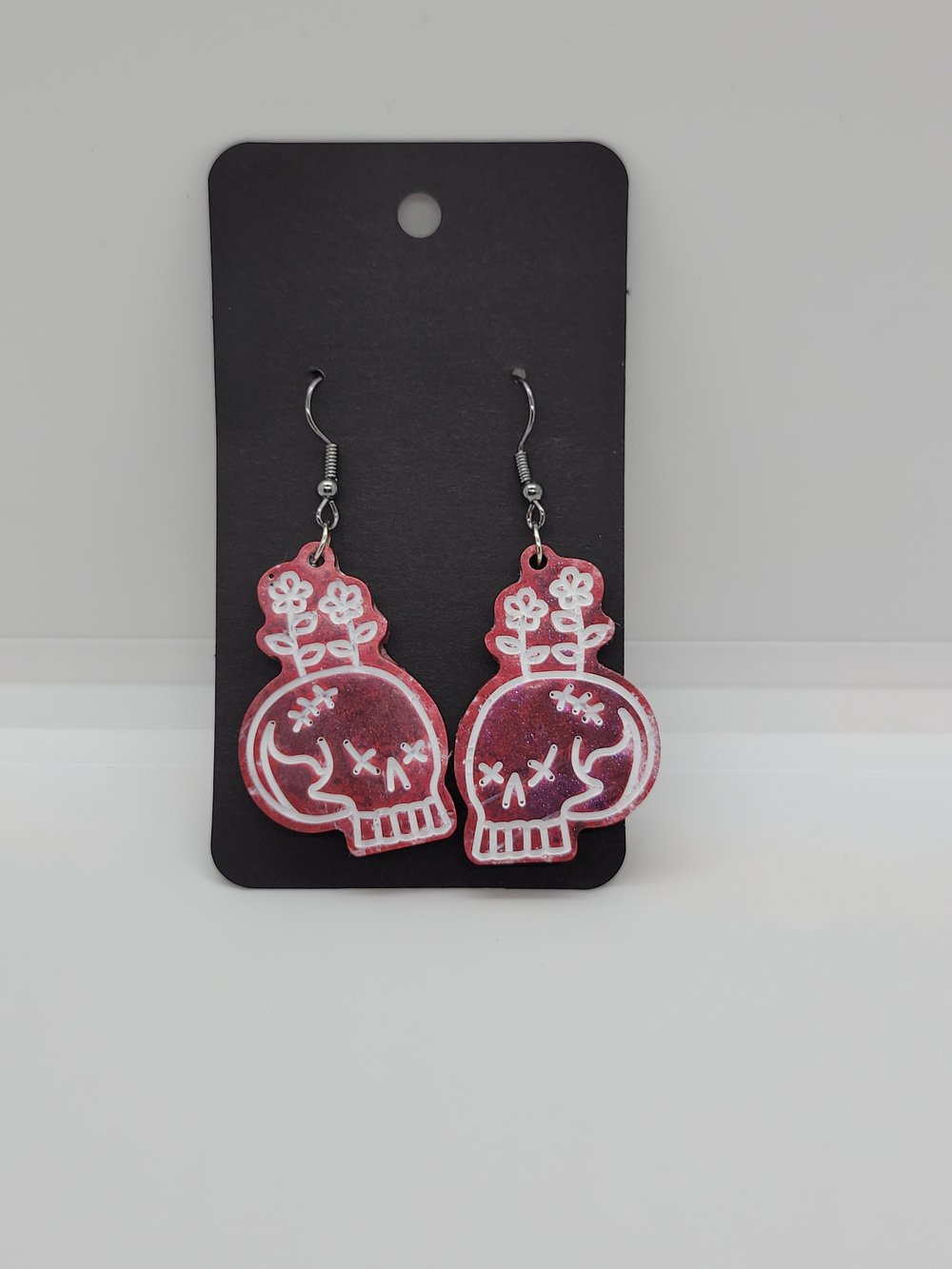 Image of Flower Skull Earrings