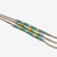 Image 1 of Bracelet Or et turquoise "Janus"