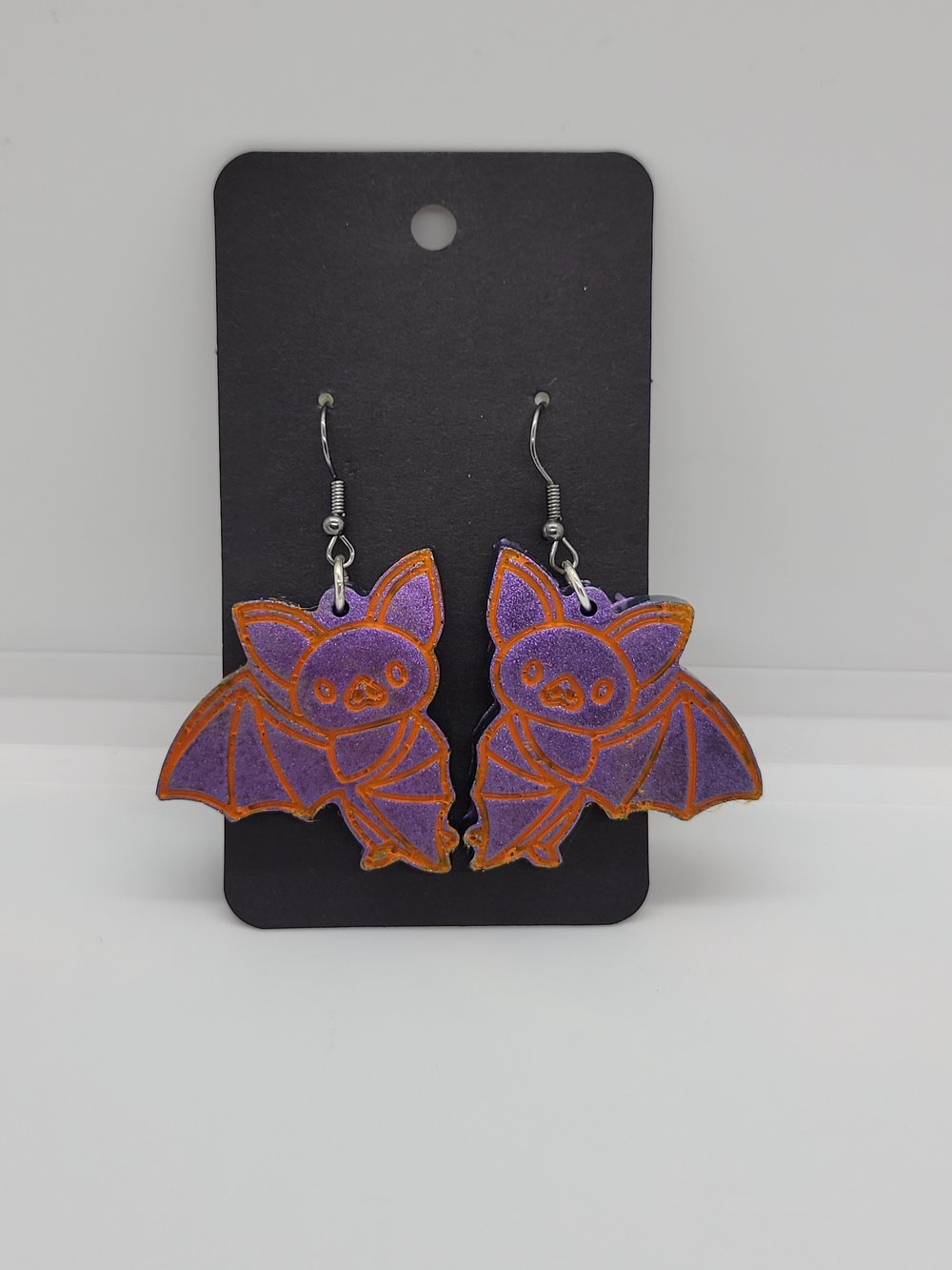 Image of Purple and Orange Bat Earrings