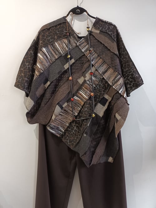 Image of fabric collage poncho