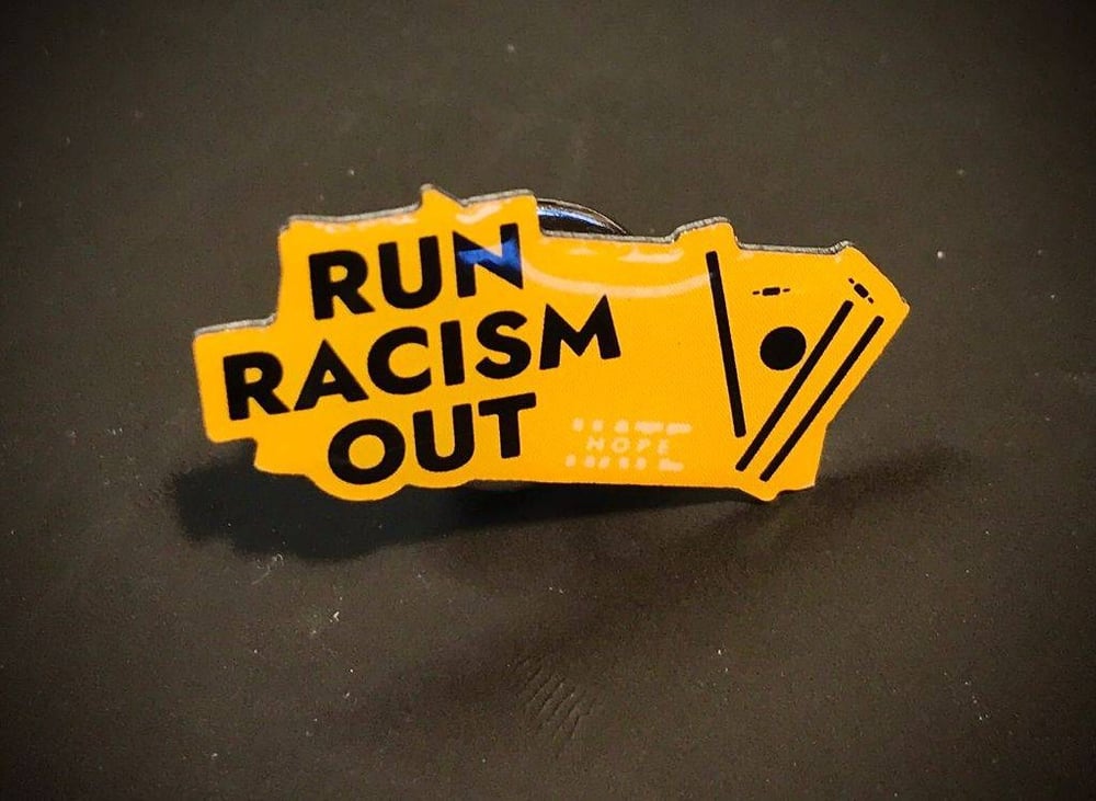Run Racism Out! pin badge