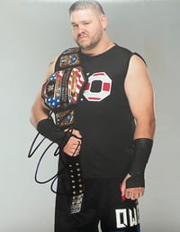 Image 2 of WWE Kevin Owens autographed 8x10 photo W/US title