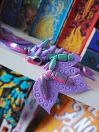 Image 1 of Mini dragón arcoiris flor