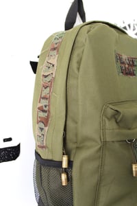 Image of arm me backpack in army green
