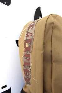 Image of arm me backpack in forest brown 