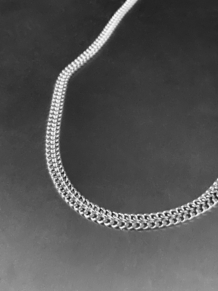 A LANGUAGE INTERWOVEN WITH SILVER 
So that you may quilt your scattered pieces together,
And, in time, find yourself whole again.



WOVEN Necklace is made with a pure sterling silver chain with a slim flat woven structure profile and is 50cm long. 

This piece is timeless in it's look and standing out with its elegance.

 It looks delicate when used as a solitaire and bold when stacked.

~To be loved and kept forever~
