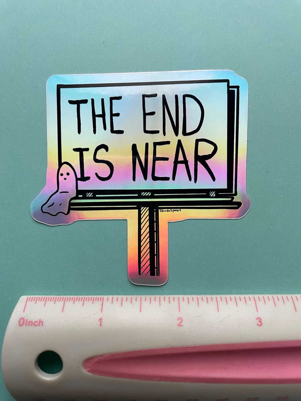 Image of Holographic ghost sitting on a billboard sticker - inspired by lyrics from Phoebe Bridgers