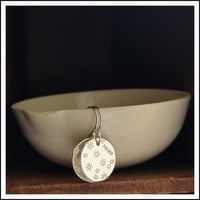 Image 1 of Stamped Disks