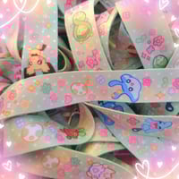 Image 1 of baby pkmn daycare lanyard