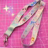 Image 2 of baby pkmn daycare lanyard