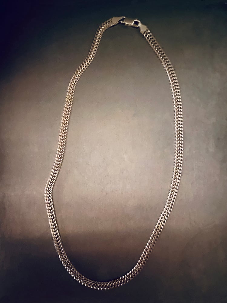 A LANGUAGE INTERWOVEN WITH SILVER 
So that you may quilt your scattered pieces together,
And, in time, find yourself whole again.



WOVEN Necklace is made with a pure sterling silver chain with a slim flat woven structure profile and is 44,5 cm long. 
On request we are able to make other lengths. 

This piece is timeless in it's look and standing out with its elegance.

 It looks delicate when used as a solitaire and bold when stacked.

~To be loved and kept forever~