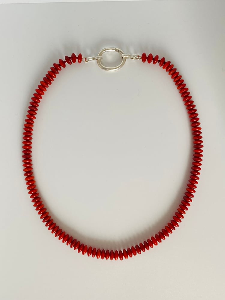 THIS BEAUTIFUL CORAL GEMSTONES ARE A FRESHNESS DOSE AND REMINDER OF THE VIBRANCY OF LIFE

A delicate object finds its opposite in a strong pattern.
The natural, organic beauty of the bamboo coral are shaped in discs and the necklace contains a oversized closure. 

A spectacular piece quietly standing out with its elegance. 

It's possible to request another length that would work best for you, please leave a note or take contact with us.

Please realize that this deep-s...