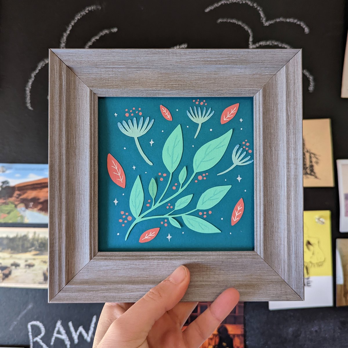 Image of Teal floral cut paper
