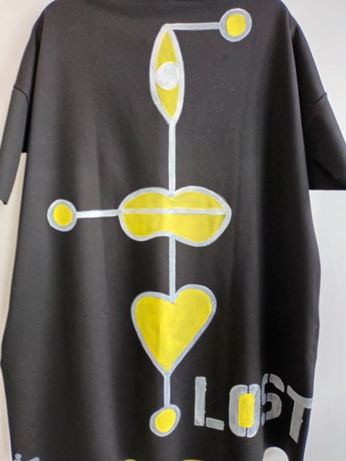 Image of painted yellow and black tunic/dress "lost and found"
