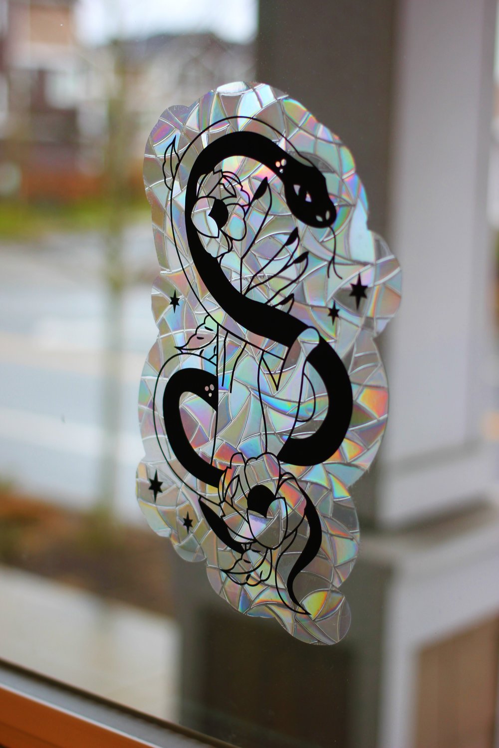 Image of Snake Flowers Sun Catcher