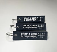 Image 2 of Drop A Gear And Disappear Key Clip