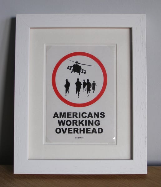Image of Americans Working Overhead - Original POW Banksy Sticker