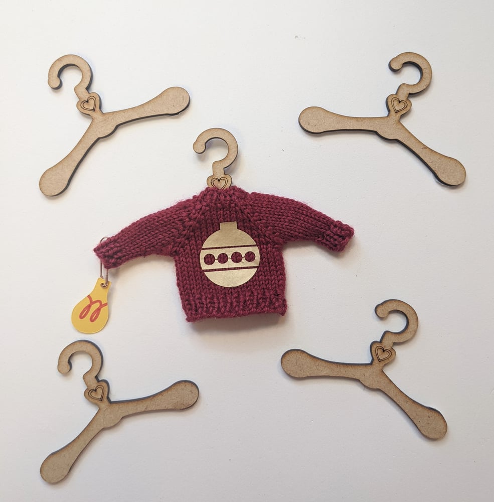 Image of Hangers for Tiny Sweaters