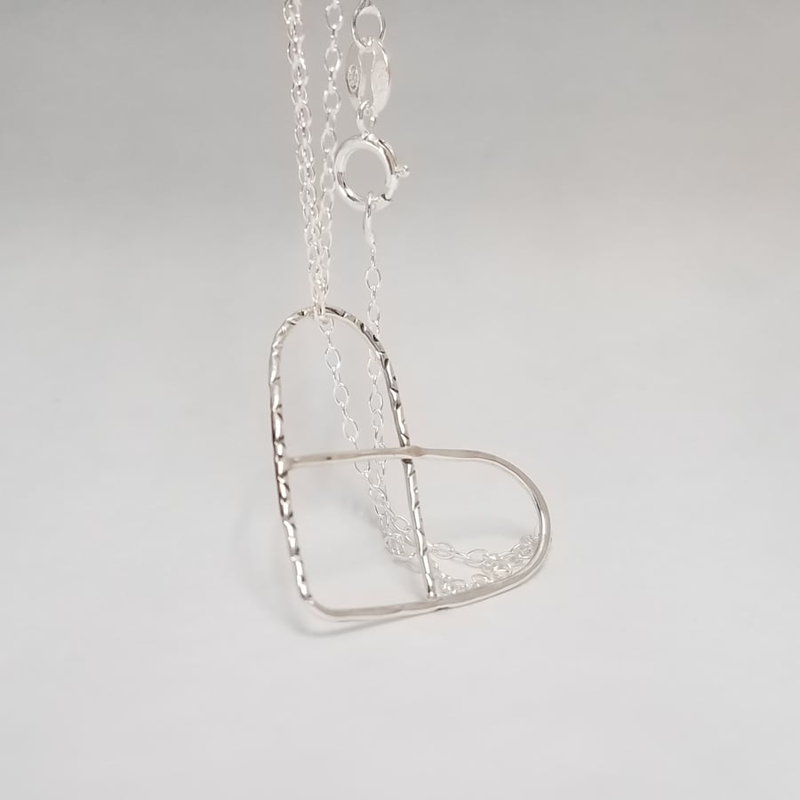 Image of Floating heart space pendant