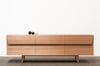 CLIPPED WING SIDEBOARD IN TASMANIAN OAK WITH TIMBER BASE