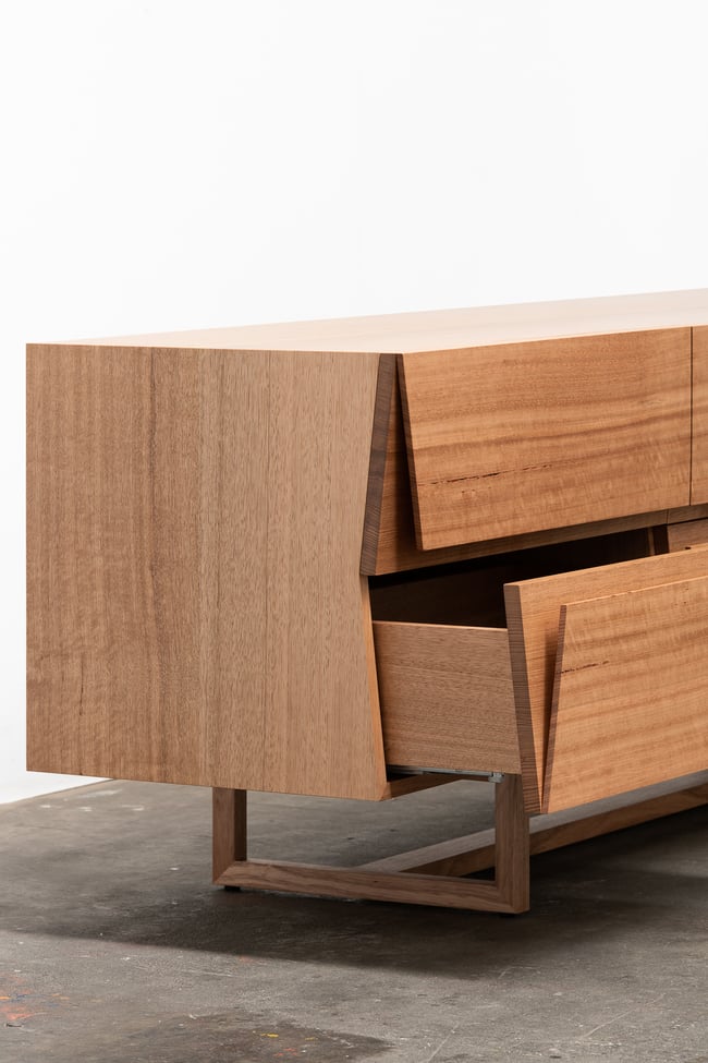 CLIPPED WING SIDEBOARD IN TASMANIAN OAK WITH TIMBER BASE
