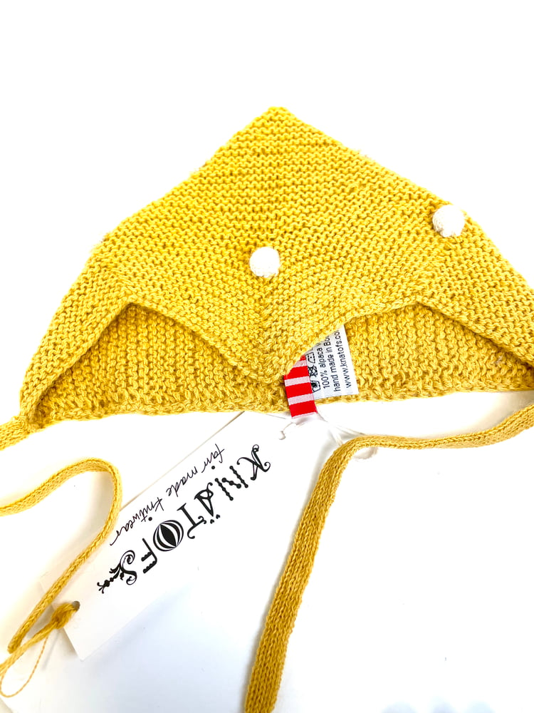 Image of Pom pom hat yellow