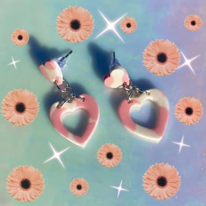 i love moo cow print dangly heart studs 🐮