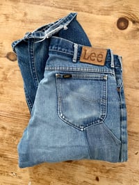 Image 1 of 70s REPAIRED LEE RIDERS JEANS