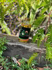 4 oz bottle of Growth oil 