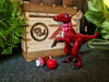 Handpainted realistic Dinoboi resin figure with stuffed shipping crate