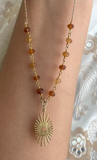 Image 3 of hessonite sun 