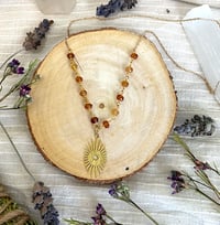 Image 1 of hessonite sun 