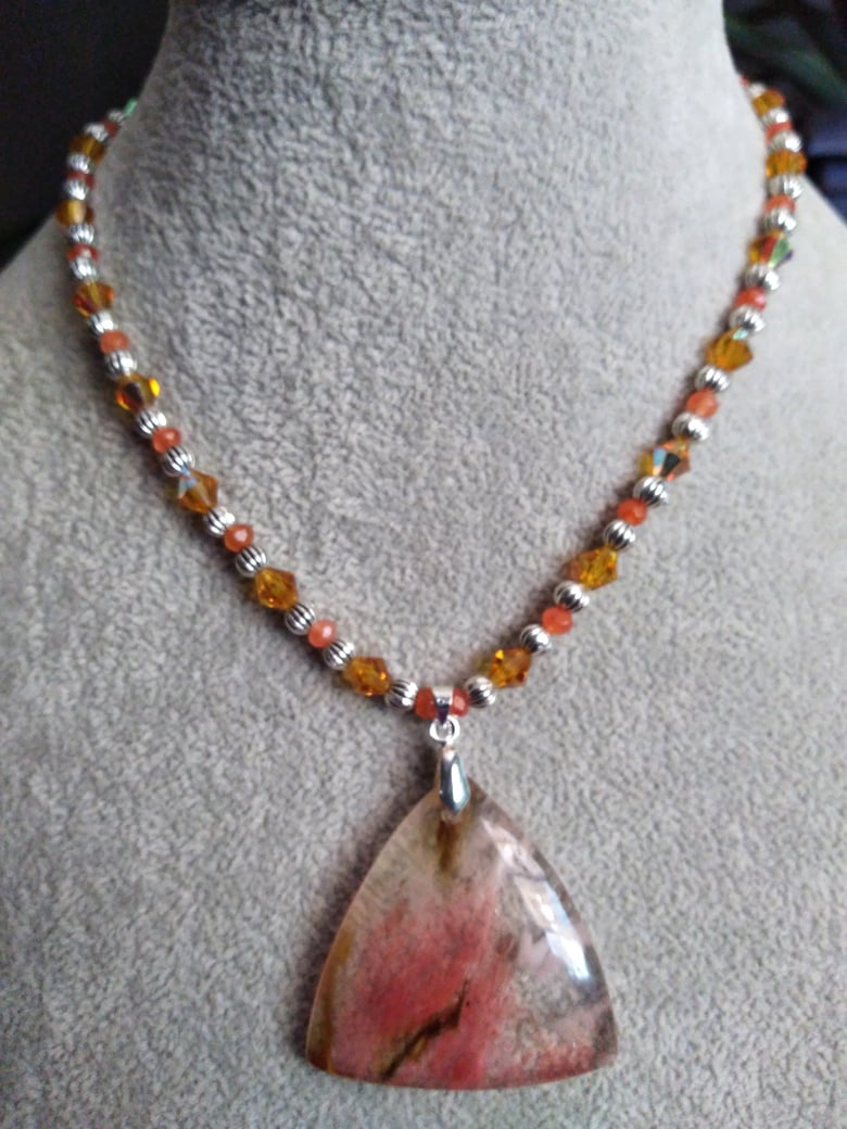 Image of TRANSLUCENT PENDANT WITH PEACHY UNDERTONES