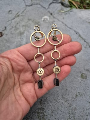 Long earrings with bullet casings and green stones 