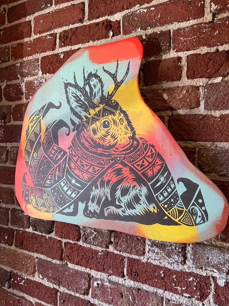 Image of The Haretic on Aged Plywood