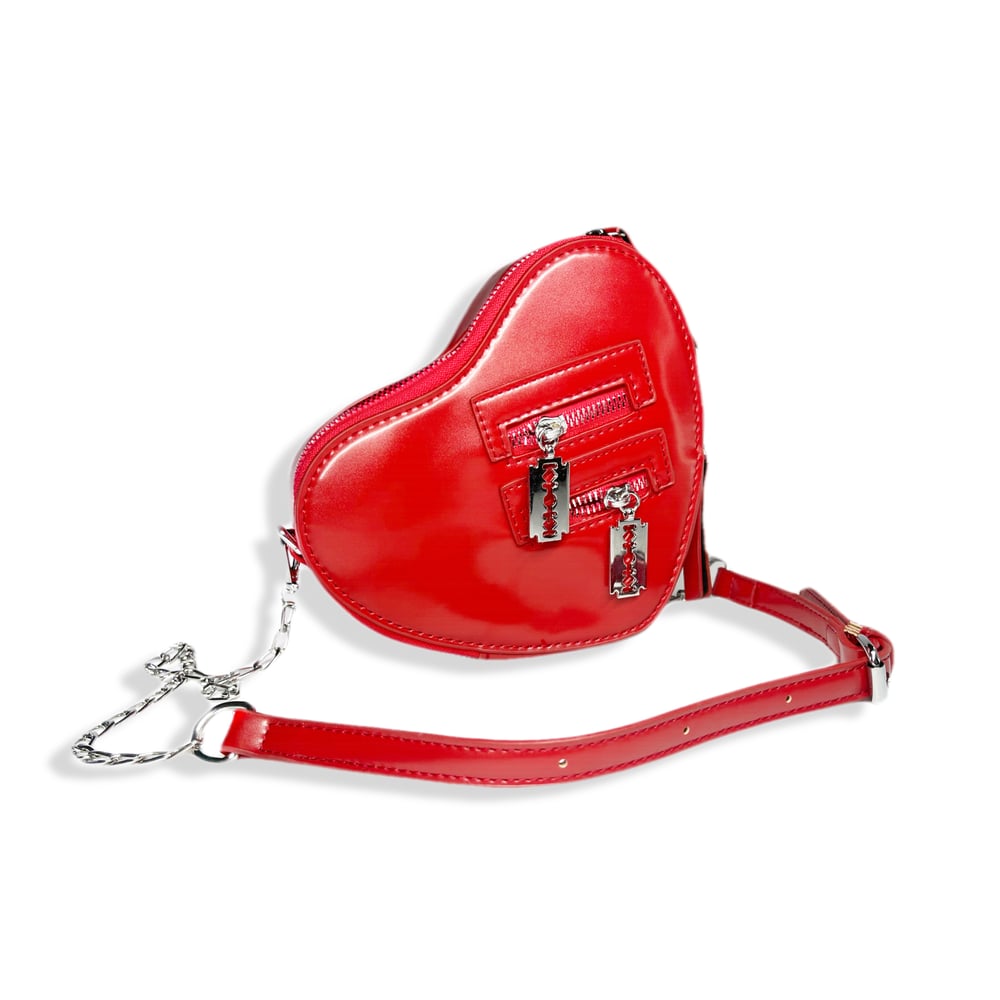 Heart shaped Purse with Razors