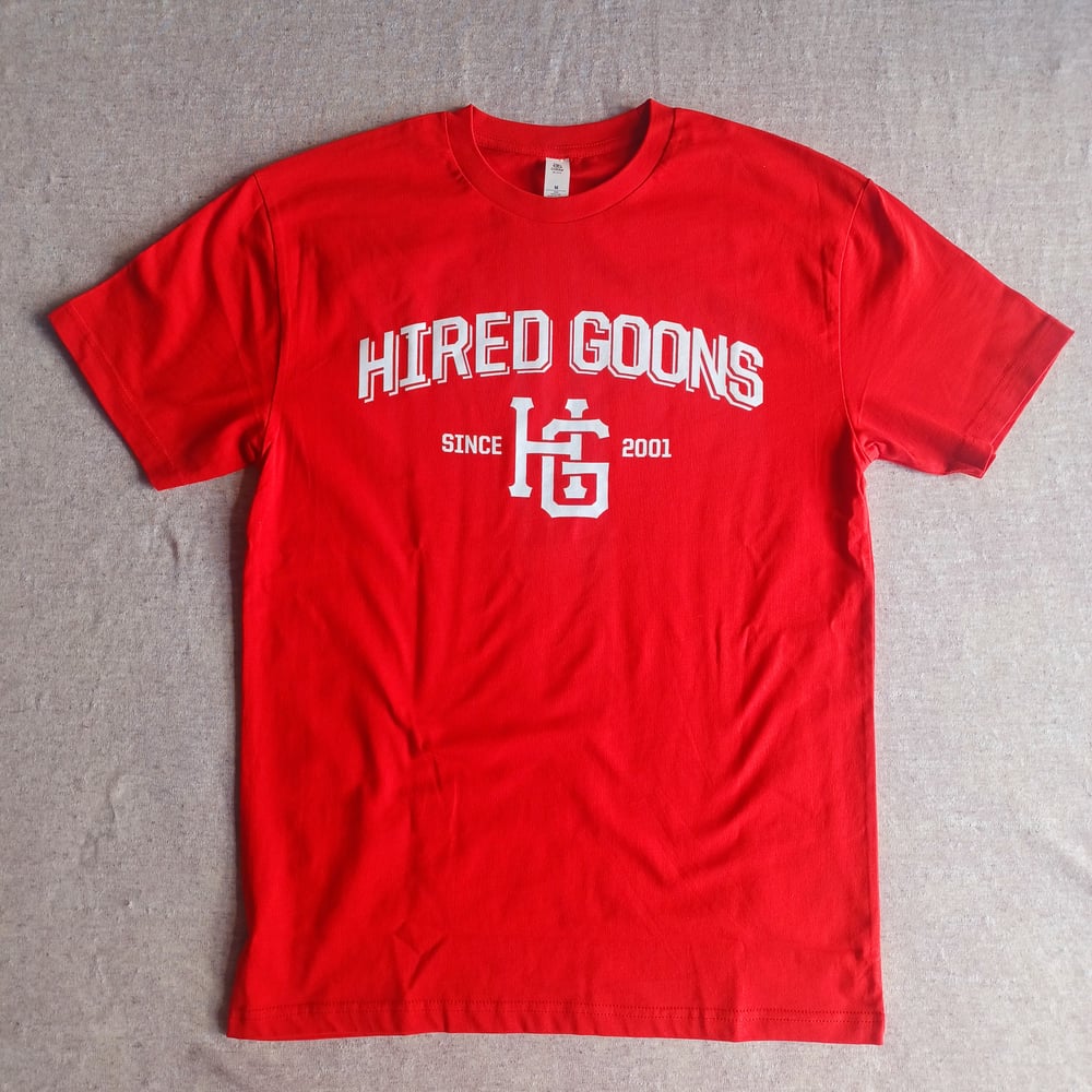 Image of "HIRED GOONS" College shirt.  White on Blood Red