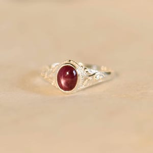 Image of Vietnam Red Star Ruby oval shape cabochon cut vintage style silver ring